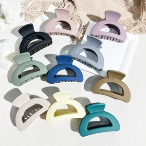 Flat lay of 10-piece matte Morandi hair claws set on a decorative tray
