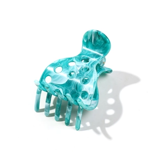 Elegant marble pattern turquoise hair claw clip for women with a hollow design