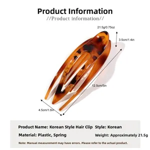 Detail view showing dimensions of leopard print duckbill hair clip: 12.5cm long and 4.5cm wide