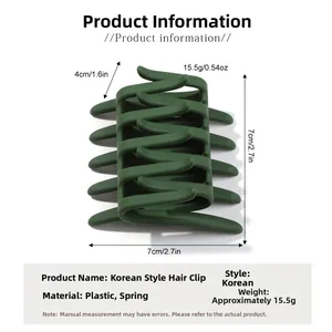 Detail view of large matte dark green hair claw clip showing size 7cm x 4cm and weight