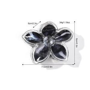 Glittery marble pattern frangipani hair claw clip with black smoky flower design