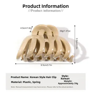 Detail view of large matte beige hair claw clip showing precise 9.5cm size measurements