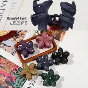 8cm flower hair claw clip with rhinestones in various matte colors on a wooden tray