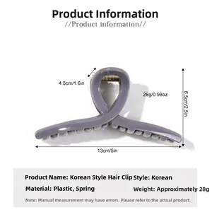 Detail of grey matte large hair claw clip showing durable spring and cross-tooth structure