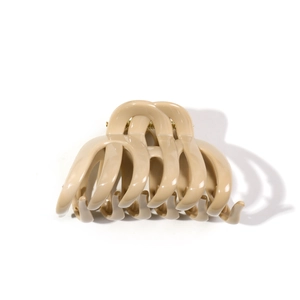 Beige pumpkin-shaped silicone hair claw clip with wave design for thick hair