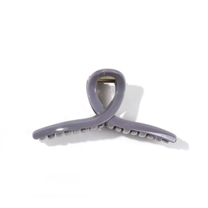 Minimalist grey jelly crossover hair claw clip made of durable resin with gold spring