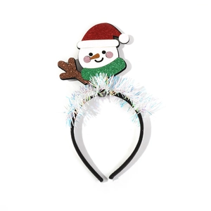 Festive Christmas headband with sequined snowman and red Santa hat on white background