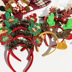 Sparkly Christmas headbands with sequins and antlers for festive holiday decorations