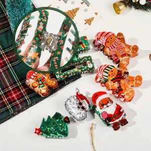 Simpatiche mollette per capelli natalizie con Babbo Natale e alberi di Natale