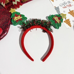 Detailed view of Christmas tree headband with sequins and Merry Christmas text