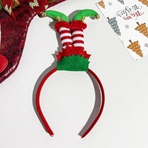 Detail of Christmas headband with elf legs design, striped fabric and golden bells