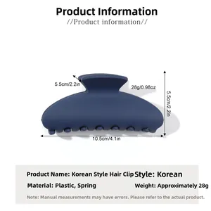Detail view of navy blue matte hair claw clip showing 10.5cm dimensions and spring mechanism