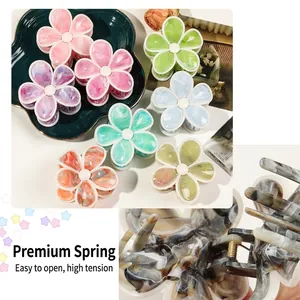 Eleganter Haarclip in Blumenform mit buntem Marmormuster und starker Metallfeder
