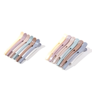 Set of 12 matte hair clips for root volume in assorted morandi colors on white background
