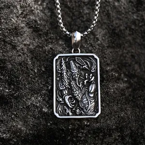 Vintage stainless steel rectangular pendant featuring relief oriental mythology engraving