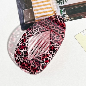 Chic red leopard print resin hair claw clip with cutout design for women