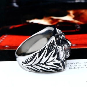 Vintage stainless steel ring for men with intricate relief textures and gothic engraving