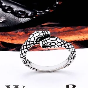 Vintage stainless steel double snake head ring with realistic scale texture and oxidized finish