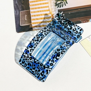 Blue leopard print rectangular hair claw clip with stylish transparent tortoiseshell finish