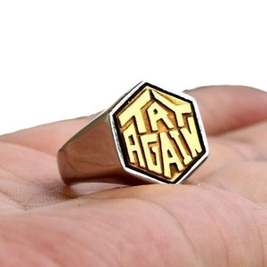 Hexagon stainless steel ring for men featuring golden Try Again text on black signet