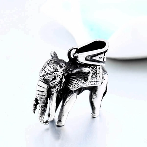 Vintage stainless steel elephant pendant necklace with detailed silver relief engravings