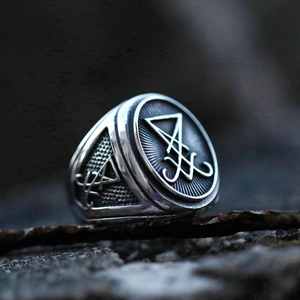 Macro view of stainless steel Lucifer sigil ring with vintage embossed details