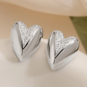 Elegant heart-shaped 18K gold plated copper earrings featuring sparkling zircon inlay details