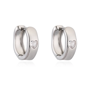 Elegant silver heart-shaped zircon huggie hoop earrings with polished metallic finish
