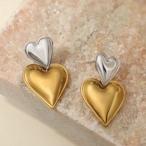 Minimalist heart-shaped contrast color earrings with gold and silver polished finish