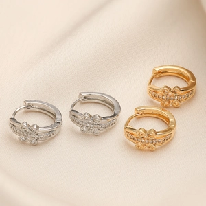 Elegant 18K gold and silver hoop earrings with bowknot zircons on champagne silk