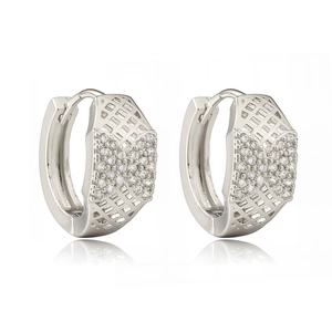 Silver bow knot huggie earrings with cubic zirconia and geometric hollow pattern
