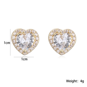 Detail view of 18K gold plated heart stud earrings with white zircon measuring 1cm x 1cm