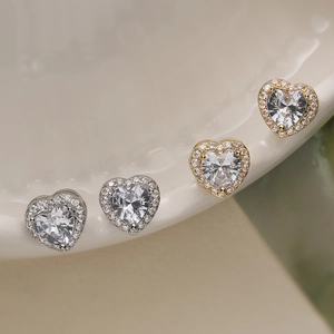 Elegant 18K gold plated copper heart stud earrings with sparkling cubic zirconia halo