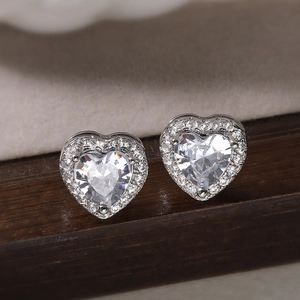 Elegant 18K gold plated copper heart stud earrings with cubic zirconia halo design