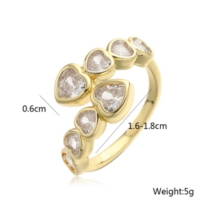 Adjustable gold plated heart ring with sparkling cubic zirconia stones and open band