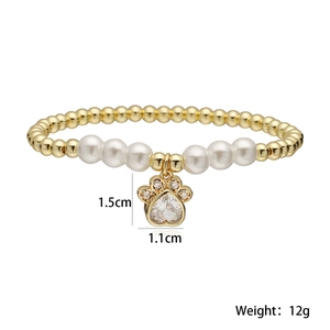 18K vergulde pootjesarmband met witte parels en hartvormige zirkonia-steen