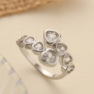 Elegant gold-plated geometric open ring with multiple heart-shaped cubic zirconia stones