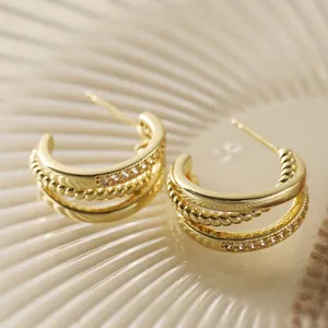 Triple layer C-shaped 18K gold earrings with smooth, rope twist and pave CZ stones