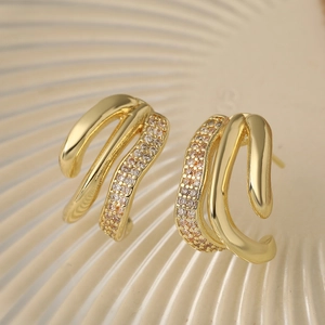 Elegant gold-plated geometric C-shaped hoop earrings with layered zirconia accents