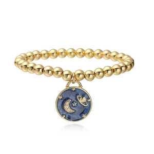 Gold beaded bracelet with dark blue enamel celestial pendant featuring moon and stars