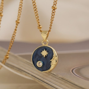 Vintage 18k gold plated sun moon and star pendant necklace with blue enamel finish