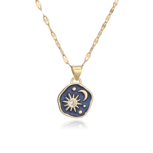 Vintage gold plated sun moon and star necklace with blue enamel and zircon detail
