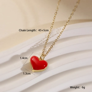 Macro shot of red heart pendant necklace with 45+5cm chain length and 1.4cm size specs