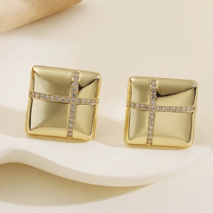 Minimalist gold square stud earrings with cross-set zircons on a white display stand