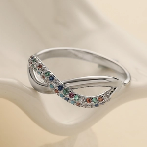 Infinity band ring in 18K gold plated copper with multi-colored cubic zirconia stones