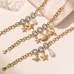 18K gold plated stainless steel marine bracelet with starfish and baroque pearl charms