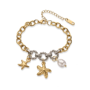 Detail of 18K gold stainless steel bracelet with starfish charms and baroque pearl