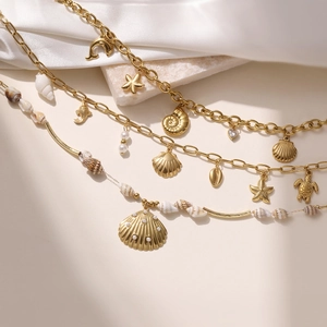 18K gold plated stainless steel necklace set with ocean shells, pearls and starfish