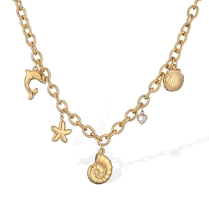 Detailed close-up of 18K gold plated necklace featuring shell and starfish charms