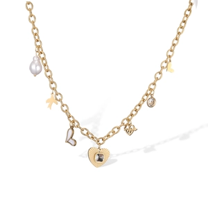 Vintage 18K gold plated stainless steel necklace with baroque pearl and sun cross charms
